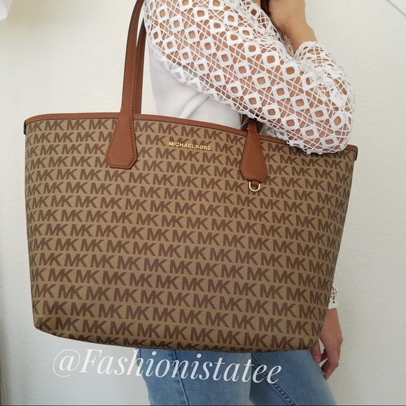 Michael Kors Handbags - NWT MICHAEL KORS CANDY LARGE REVERSIBLE TOTE BROWN